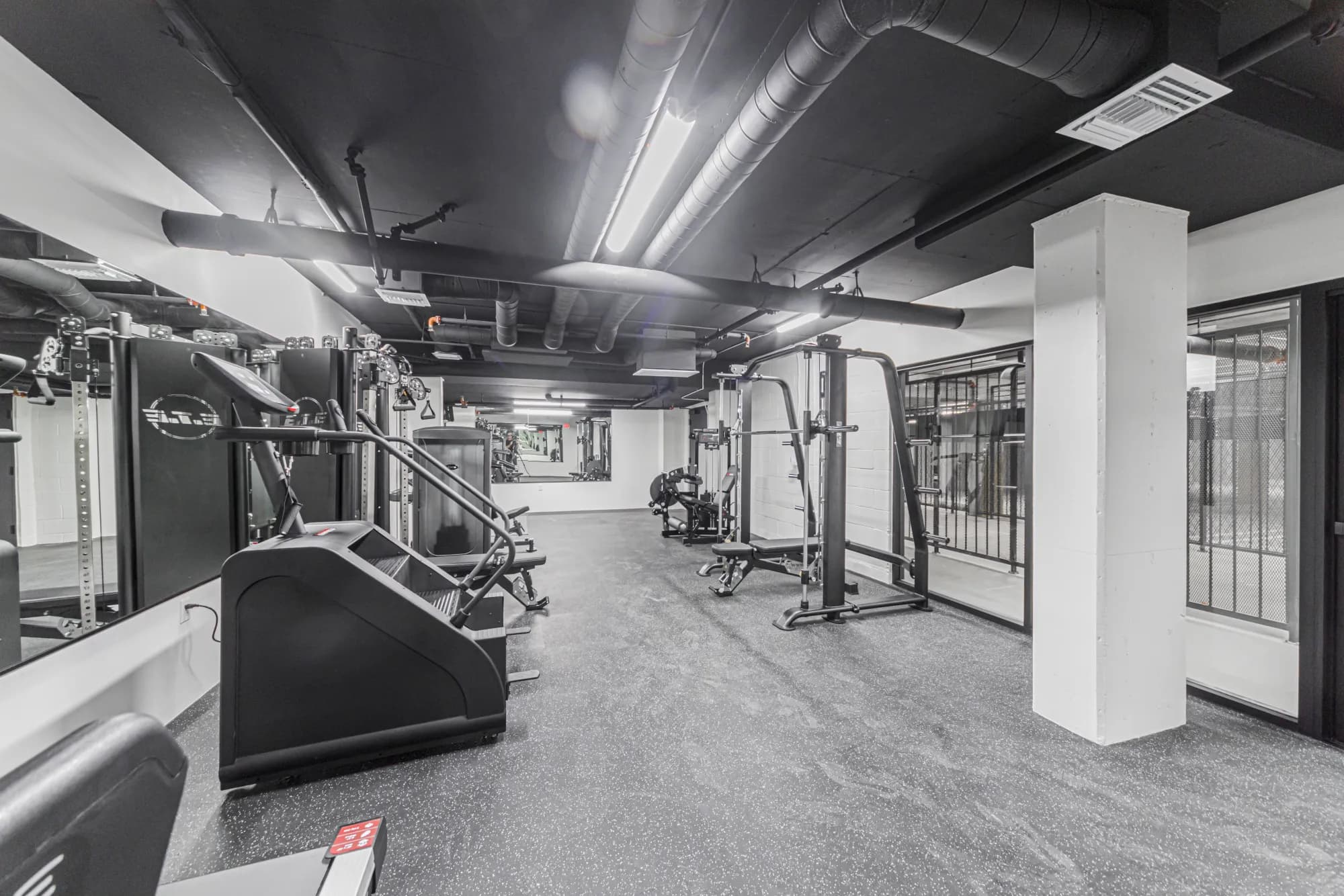 Fitness center with cardio machines at The Gramercy