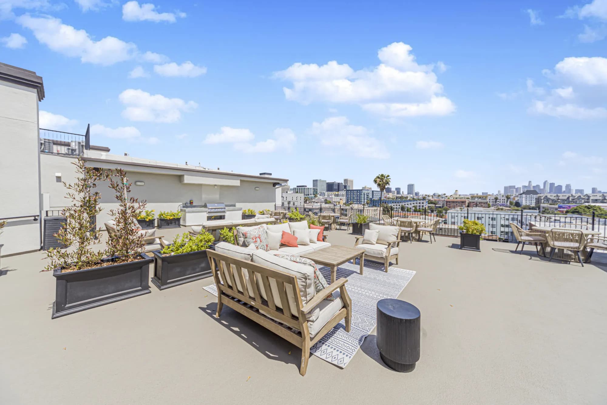 Rooftop deck seating with panoramic Koreatown views at The Gramercy